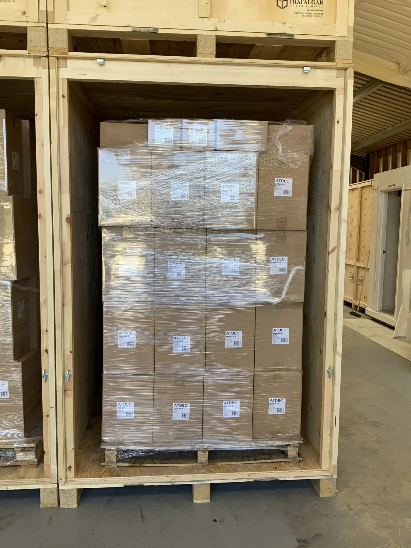 A wrapped and crated pallet stored inside a timber storage bay